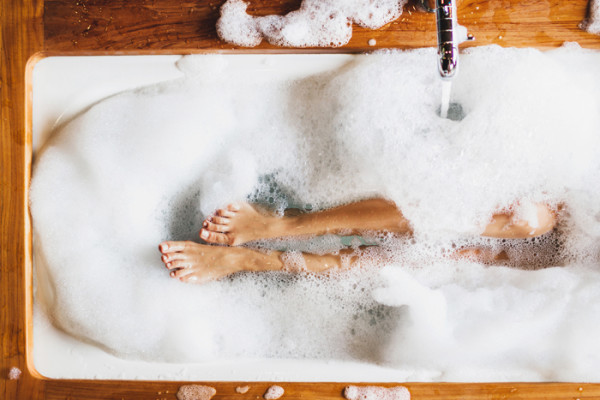 Legs in bubble bath